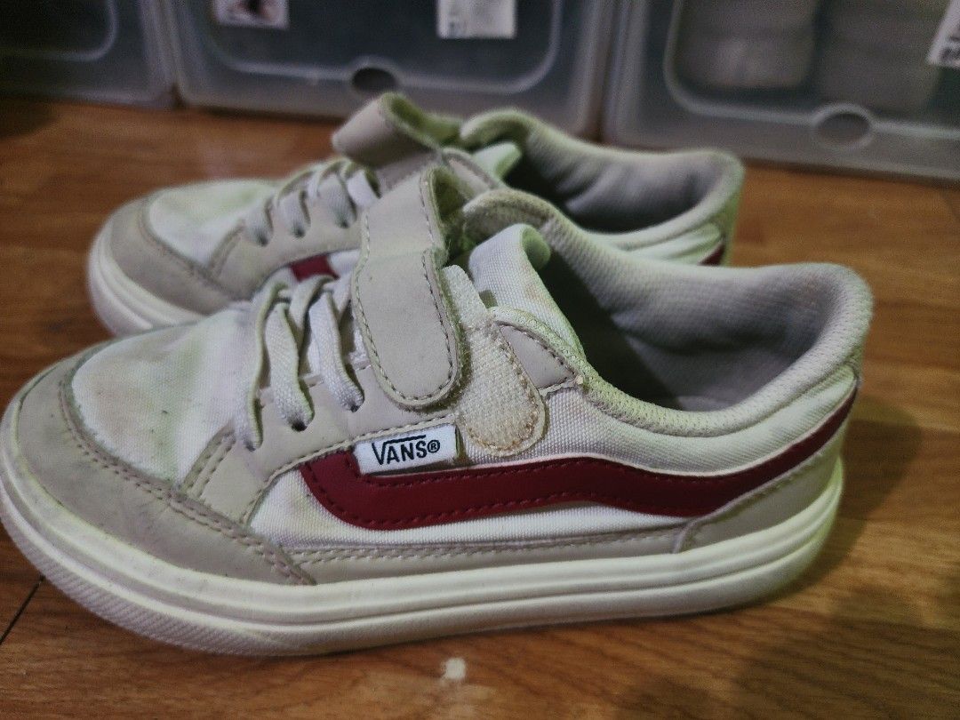 Vans Kids Shoes Size 19CM (Category: Babies & Kids Fashion) located in Imus. Submitted by momsiereyz (Listing ID 1447653036, Image 3). Description: - Kids Vans Shoes - Color: White and Beige with Red Stripe detail - Closure: Velcro strap and laces - Size: 19Cm - Condition: Some signs of wear (please check photos for details) - Ideal for: Everyday wear.