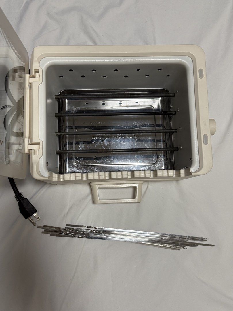 Vermax 2 Layer Multifunctional Skewer Maker Electric Grill (Category: Cookware & Accessories) located in Manila. Submitted by doodlessss (Listing ID 1447523974, Image 3). Description: Vermax 2 Layer Multifunctional Skewer Maker Electric Grill - Lightly Used - Originally bought from online store (SRP 2,975) - RFS: decluttering - 4-in-1 Grill & Hotpot Combo - Compact & Smokeless Design - 360 Rotating Grill - Color: White - Power: 800 Watts - Voltag