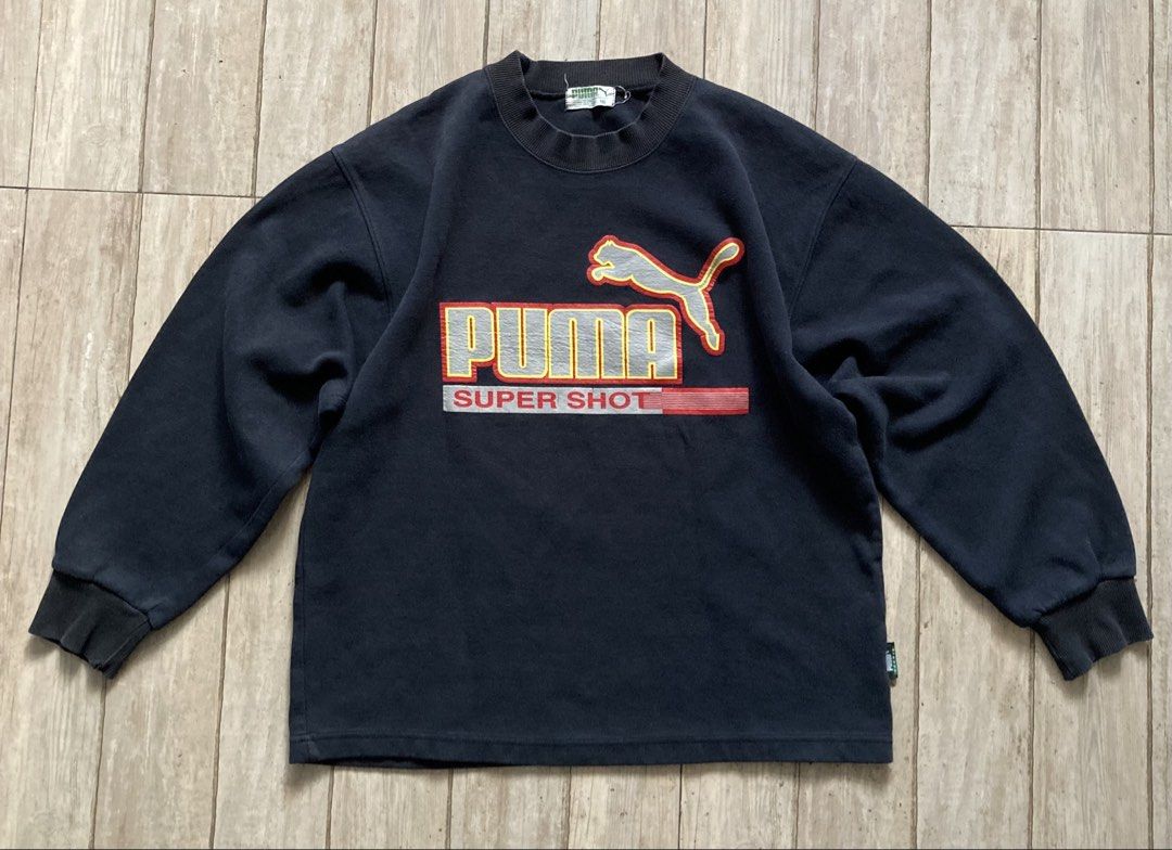 Vintage PUMA Crewneck Sweatshirt (Category: Coats, Jackets and Outerwear) located in Manila. Submitted by lance_ami (Listing ID 1447560562, Image 1). Description: Vintage PUMA Crewneck Sweatshirt Width: 20 in Length: 24 in Condition: Item is vintage, expect fading. Slight bacon on collar-line..