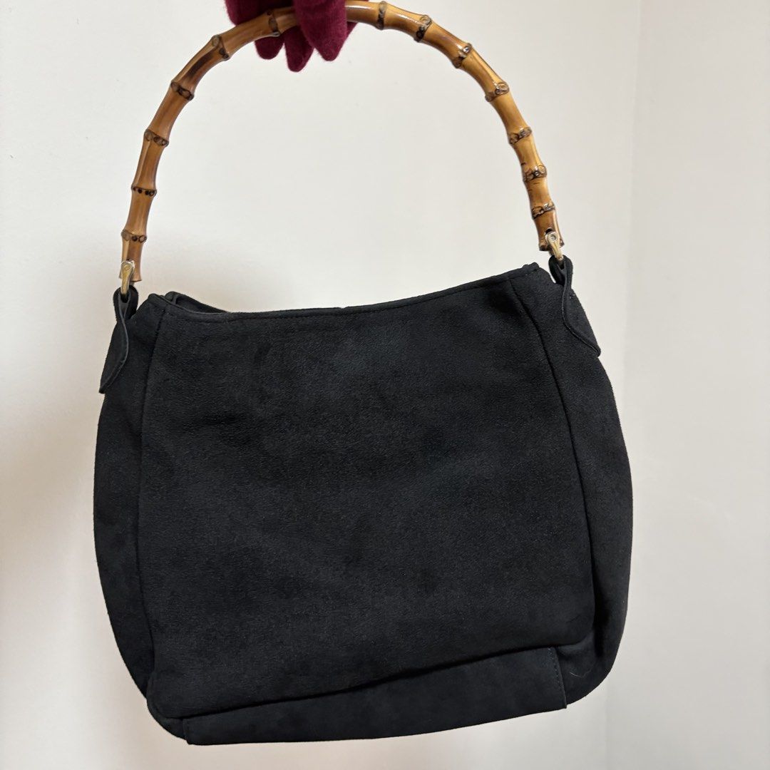 VINTAGE SUEDE SHOULDER BAMBOO HANDLE WITH SLING (Category: Shoulder Bags) located in Cainta. Submitted by prebyihellop (Listing ID 1447514419, Image 1). Description: Good condition Good quality Thick and heavy Comes with sling 11x12 inch Like new Ready to use What you see is what you get.