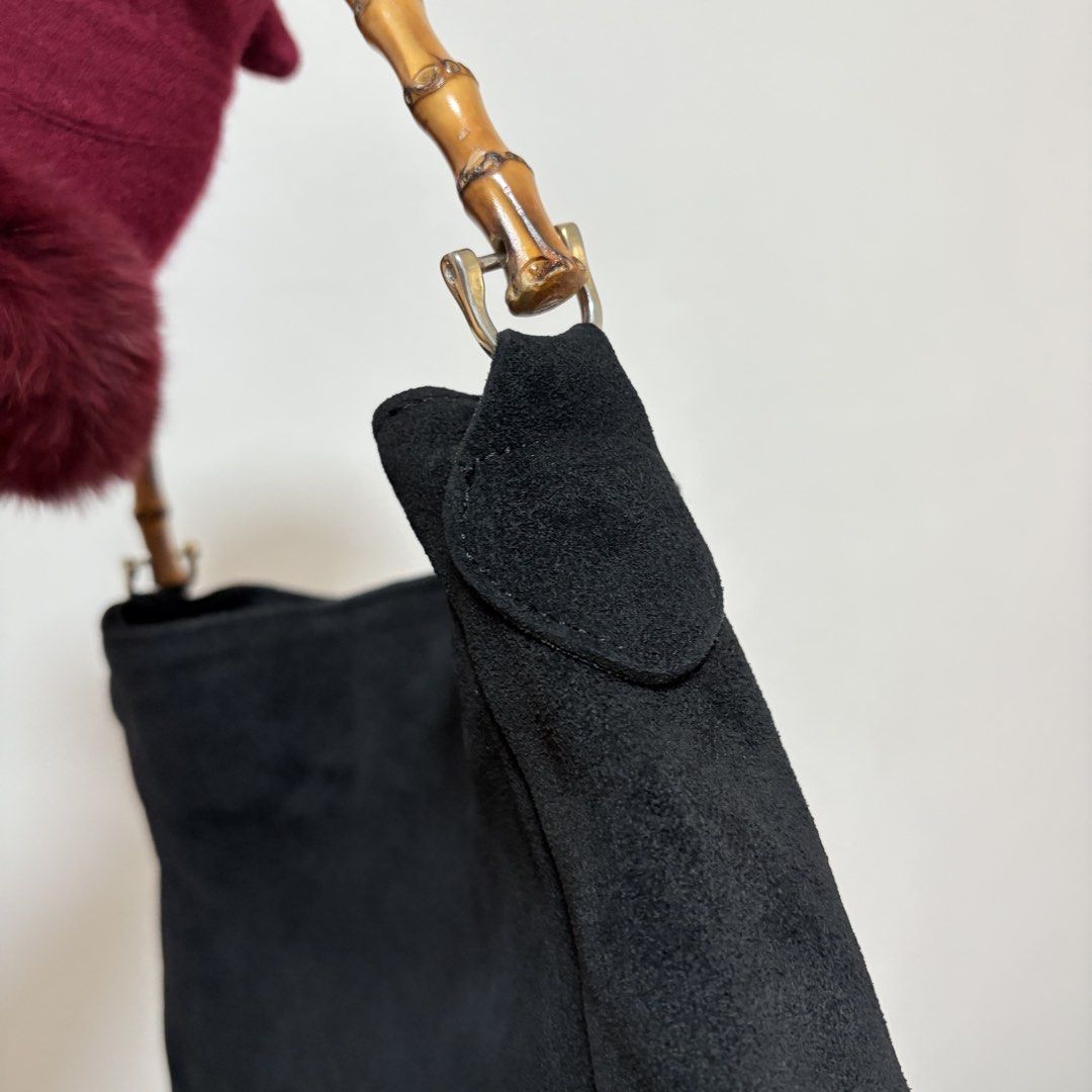 VINTAGE SUEDE SHOULDER BAMBOO HANDLE WITH SLING (Category: Shoulder Bags) located in Cainta. Submitted by prebyihellop (Listing ID 1447514419, Image 3). Description: Good condition Good quality Thick and heavy Comes with sling 11x12 inch Like new Ready to use What you see is what you get.