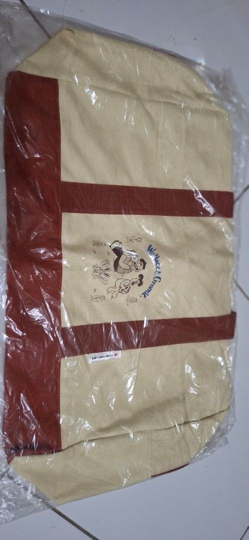 Wallace & Gromit Canvas Tote Bag (Category: Tote Bags) located in Manila. Submitted by youngcloud_b1fffa (Listing ID 1447667863, Image 2). Description: - Adorable Wallace & Gromit canvas tote bag - Classic cream color with stylish brown trim and handles - Ideal for everyday use, groceries, or as a fun accessory - Spacious interior for all your essentials - Brand new, still in original packaging "R&B Mix Japan Surplus Items".