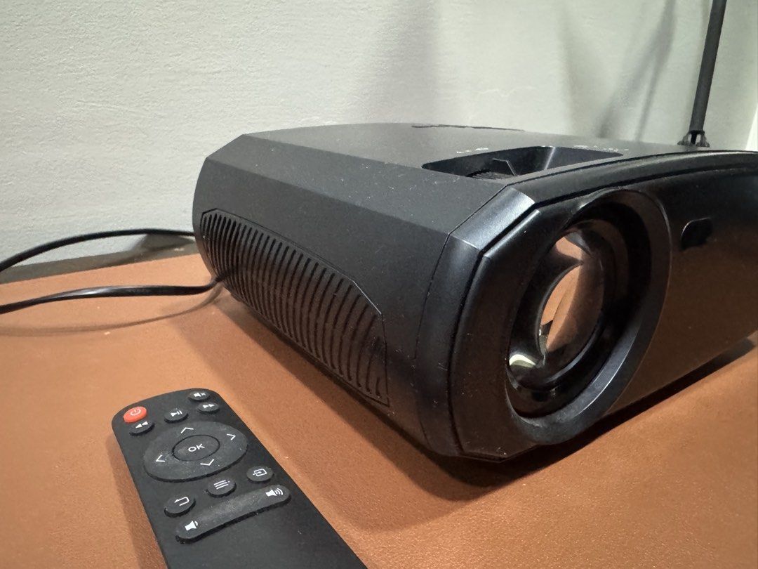WEWATCH V50 Projector with Remote (Category: Projectors) located in Manila. Submitted by kuroshirooreo (Listing ID 1447569833, Image 3). Description: - WEWATCH, LCD projector - Includes remote control, a bit noisy when using but manageable - Connectivity: SD card slot, HDMI, USB, VGA - Ideal for movie nights and presentations - In excellent working condition.