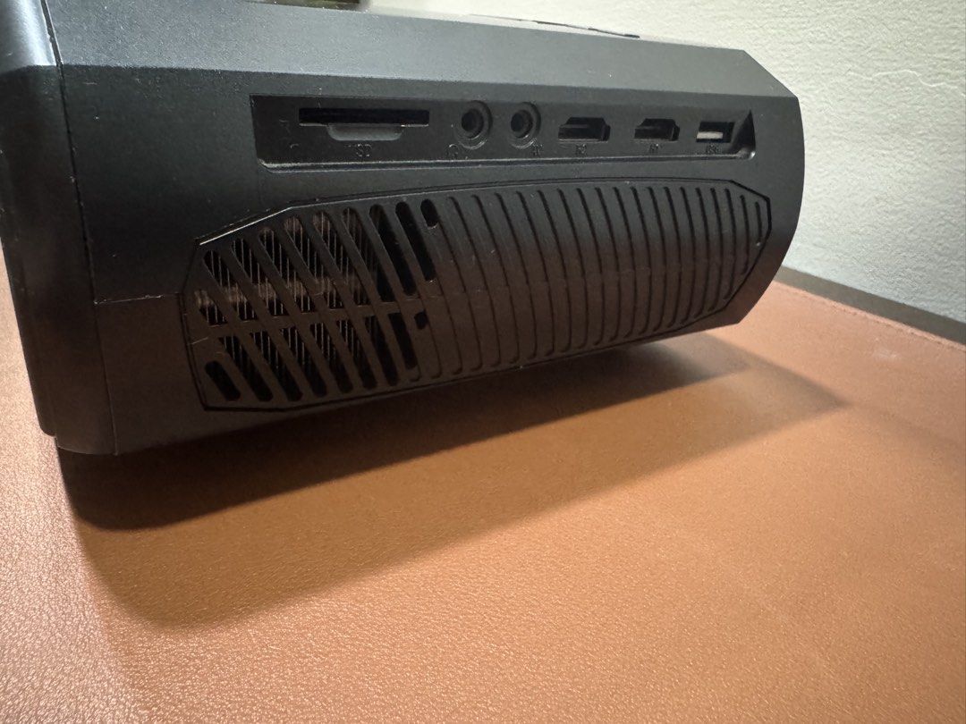 WEWATCH V50 Projector with Remote (Category: Projectors) located in Manila. Submitted by kuroshirooreo (Listing ID 1447569833, Image 2). Description: - WEWATCH, LCD projector - Includes remote control, a bit noisy when using but manageable - Connectivity: SD card slot, HDMI, USB, VGA - Ideal for movie nights and presentations - In excellent working condition.