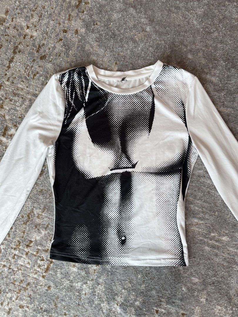 white graphic long sleeve shirt (Category: Longsleeves) located in Makati City. Submitted by sec0ndhandedly (Listing ID 1447592173, Image 2). Description: size small to medium.