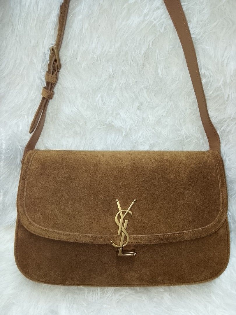 Yves Saint Laurent Medium Shoulder bag (Category: Luxury Bags & Wallets) located in Baguio. Submitted by luxuryitembags (Listing ID 1447570327, Image 1). Description: 2nd hand (original) Lightly used but no scratch or damage Dustbag and Ysl card inclusions Crafted from brown Suede and gold tone hardware negotiable price.