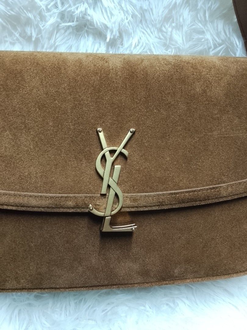 Yves Saint Laurent Medium Shoulder bag (Category: Luxury Bags & Wallets) located in Baguio. Submitted by luxuryitembags (Listing ID 1447570327, Image 2). Description: 2nd hand (original) Lightly used but no scratch or damage Dustbag and Ysl card inclusions Crafted from brown Suede and gold tone hardware negotiable price.