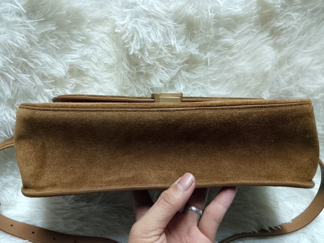 Yves Saint Laurent Medium Shoulder bag (Category: Luxury Bags & Wallets) located in Baguio. Submitted by luxuryitembags (Listing ID 1447570327, Image 3). Description: 2nd hand (original) Lightly used but no scratch or damage Dustbag and Ysl card inclusions Crafted from brown Suede and gold tone hardware negotiable price.