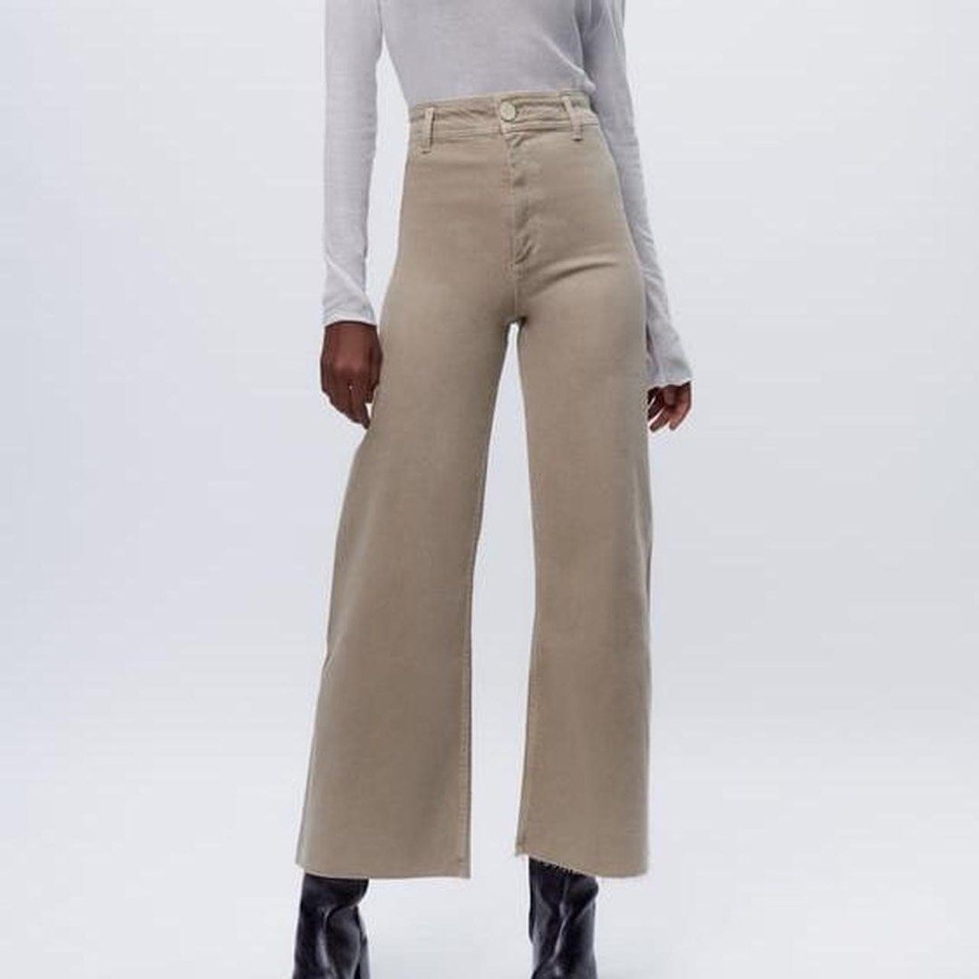 Zara Beige Wide Leg Cropped Pants (Category: Other Bottoms) located in Manila. Submitted by ella1222 (Listing ID 1447572698, Image 1). Description: - Zara beige pants - Wide leg and cropped style - Raw hem detail - Made in Tunisia - Size: EUR 38, USA 4, MEX 26 - Ideal for casual wear.