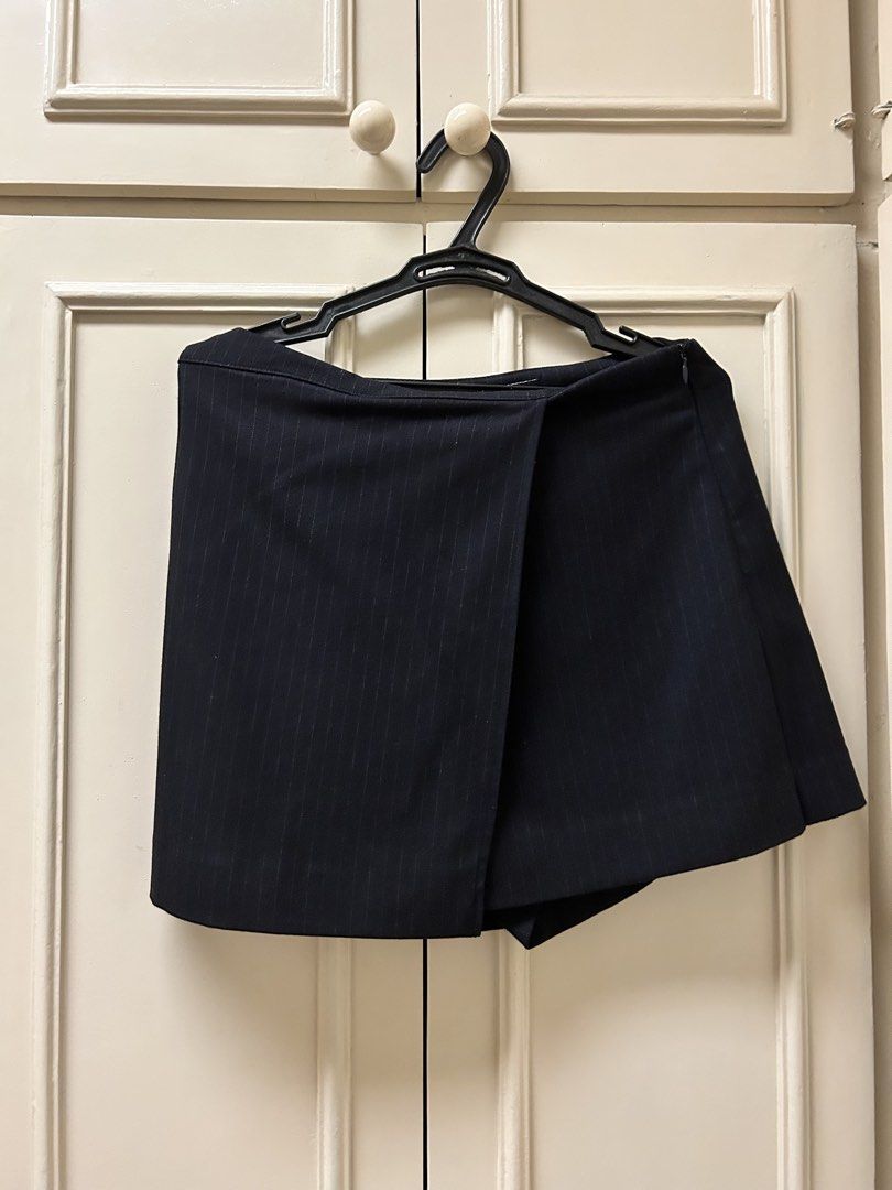 ZARA Black Pinstripe Wrap Skort Size S (Category: Skirts) located in Muntinlupa City. Submitted by caradb (Listing ID 1447654547, Image 2). Description: - Black skort with white pinstripes - Wrap front design - Side zip closure - Made in Morocco - Size S - Perfect for dressing up or down.
