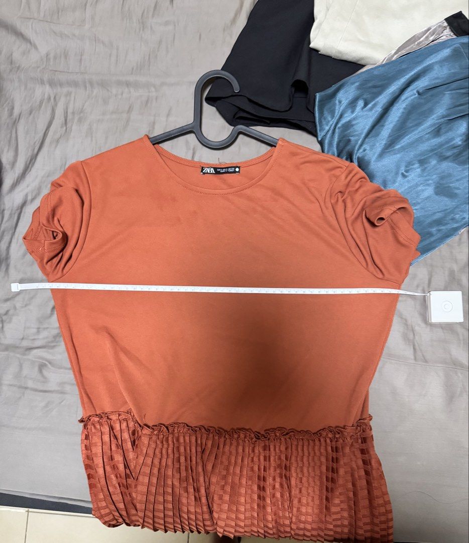 ZARA Orange Pleated Midi Dress (Category: Dresses) located in Quezon City. Submitted by spacecleaner101 (Listing ID 1447628544, Image 3). Description: Armpit to armpit 50cm Very stretchy and garterized sa waist.