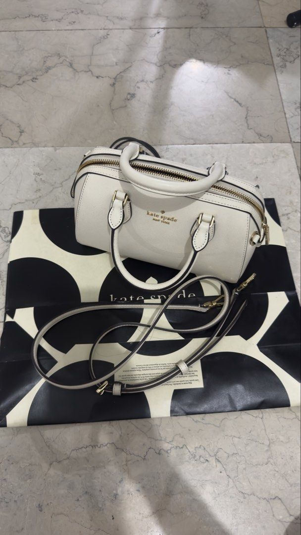 💯 AUTHENTIC Kate Spade Madison Duffle Bag (Category: Luxury Bags & Wallets) located in Manila. Submitted by eun1127 (Listing ID 1447793184, Image 3). Description: 💯 AUTHENTIC Kate Spade Madison Duffle Bag / with sling Rarely Used - In Good Condition Feel free to ask for photos for authentication purposes. RFS: Decluttering/ too many bags Price slightly negotiable 😊 .