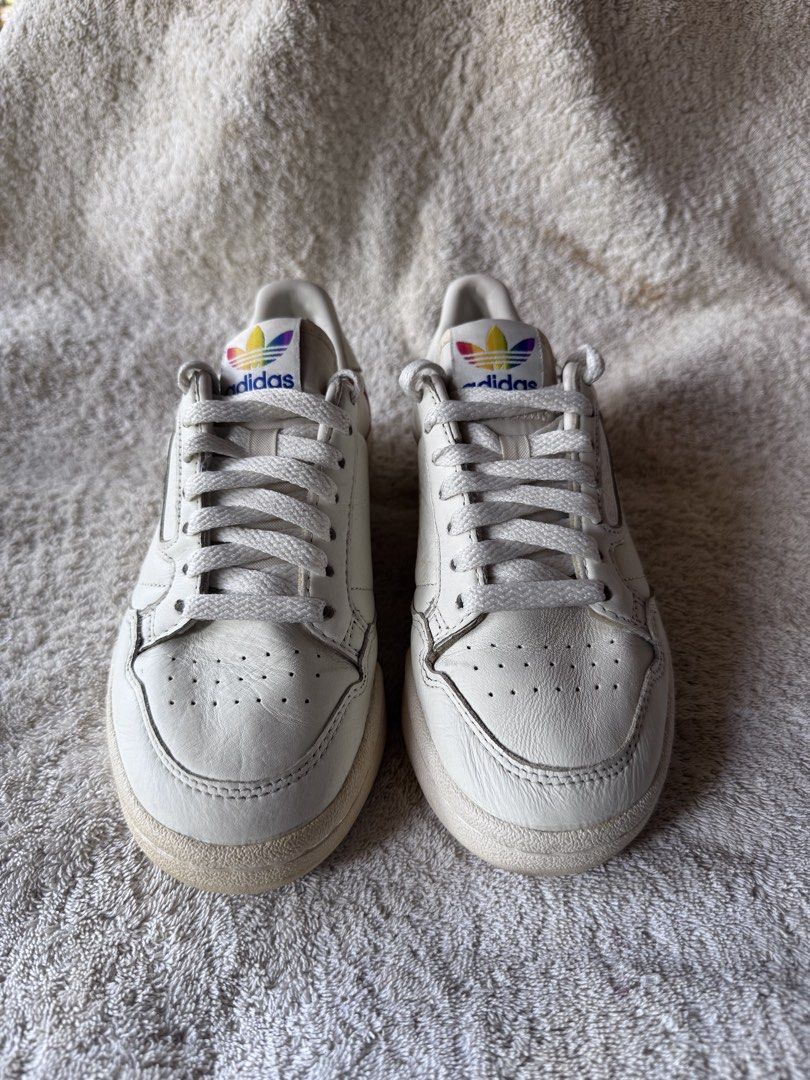 Adidas Continental 80 Rainbow Stripe Sneakers (Category: Sneakers) located in Antipolo. Submitted by kitclothing (Listing ID 1447822868, Image 3). Description: - Adidas Continental 80 sneakers - Classic white leather upper - Iconic rainbow stripes on side and heel - White laces - Soles show minor wear, still good grip - Ideal for casual wear - NO HAGGLING, FREE SHIPPING ONLY.
