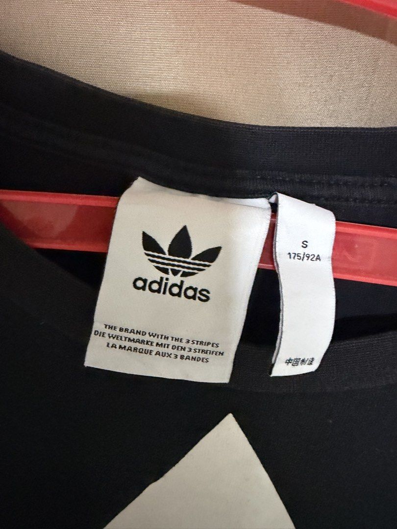 Adidas Trefoil Logo (Category: Tshirts & Polo Shirts ) located in Mabalacat. Submitted by leyxzz_declutter (Listing ID 1447824522, Image 2). Description: - Black Adidas T-shirt - Iconic white Trefoil logo - Size: fits S to M - issue crack prints - color 8/10 RFS: DECLUTTERING SLIGHTLY NEGOTIABLE .