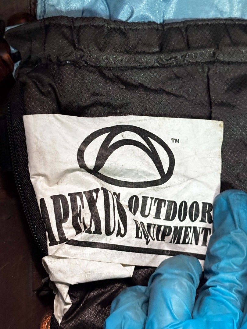 Apex Sleeping Bag (Category: Hiking & Camping) located in Quezon City. Submitted by giveitalife (Listing ID 1447882548, Image 1). Description: - Apex Outdoor Equipment sleeping bag - Mummy style design - Dark brown exterior with a lighter blue interior - Ideal for camping trips - Ready for your next adventure.