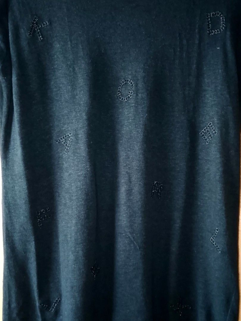 AUTHENTIC Karl Lagerfeld Women's Tee (Category: Shirts) located in Iloilo. Submitted by achinom (Listing ID 1447843086, Image 3). Description: AUTHENTIC Karl Lagerfeld Women's Tee Size SMALL Dimensions when laid flat: Chest/Bust (pit-to-pit) 18 inches (quite stretchable) Length 26 inches IN EXCELLENT USED CONDITION. NO rip, stains, or holes. Color BLACK Color rate 10/10 This black crew-neck shirt features subtle, tone-on-tone embroidered Karl Lag