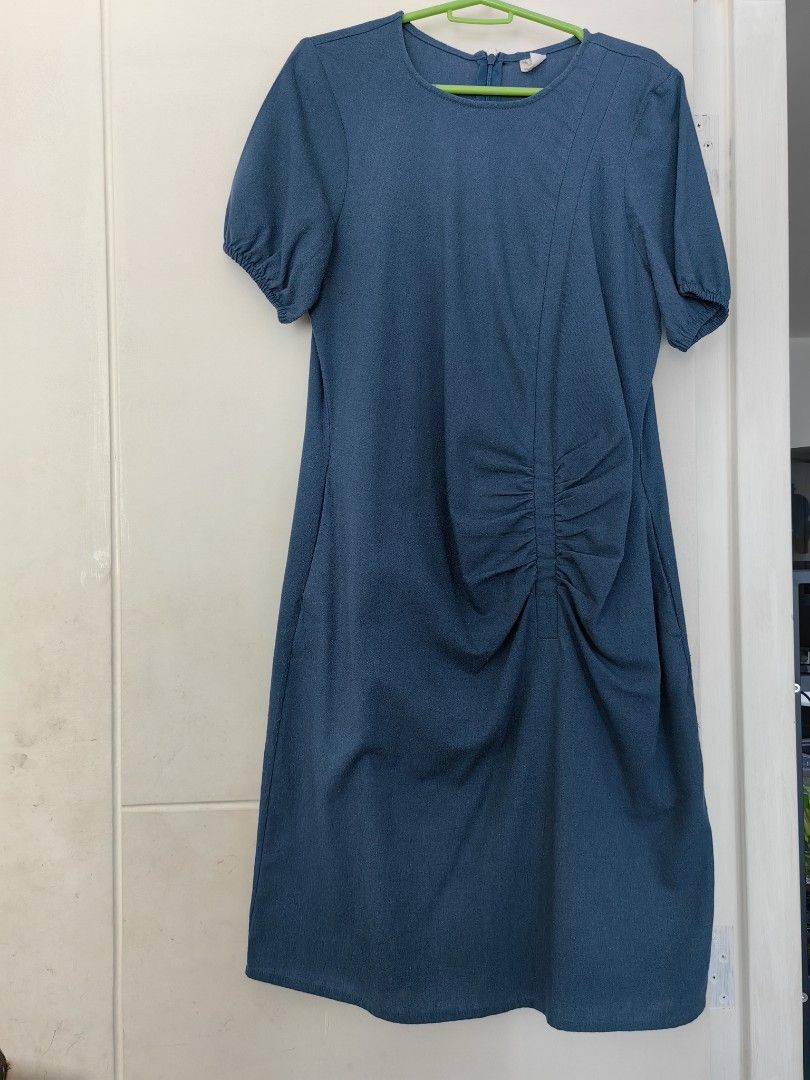 BAYO Blue Ruched Midi Dress Size Medium (Category: Dresses) located in Pasay City. Submitted by meimeitoot (Listing ID 1447841228, Image 3). Description: - Blue midi dress from BAYO - Ruched detail down the front - Short puff sleeves - Zip closure at the back - Comfortable and casual - Great for everyday and office wear.