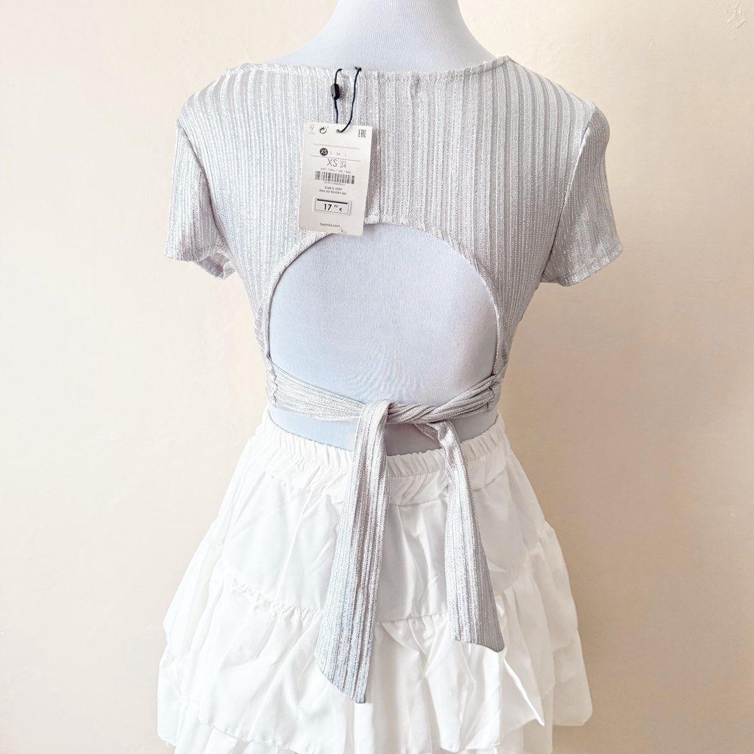 Bershka Metallic Silver Open Back Crop Top (Category: Others Tops) located in Antipolo. Submitted by rosywardrobe (Listing ID 1447810846, Image 3). Description: 🎀 MAKE READING A HABIT 🎀 • No order form, no reservation! • Strictly 1 day reservation • Payment first before order processing • No return, No exchange • Don’t make an offer if you’re not 100% sure • No shipping every weekends — PAYMENT CHANNELS — • GCash • Gotyme • Maya • BDO • BPI • U