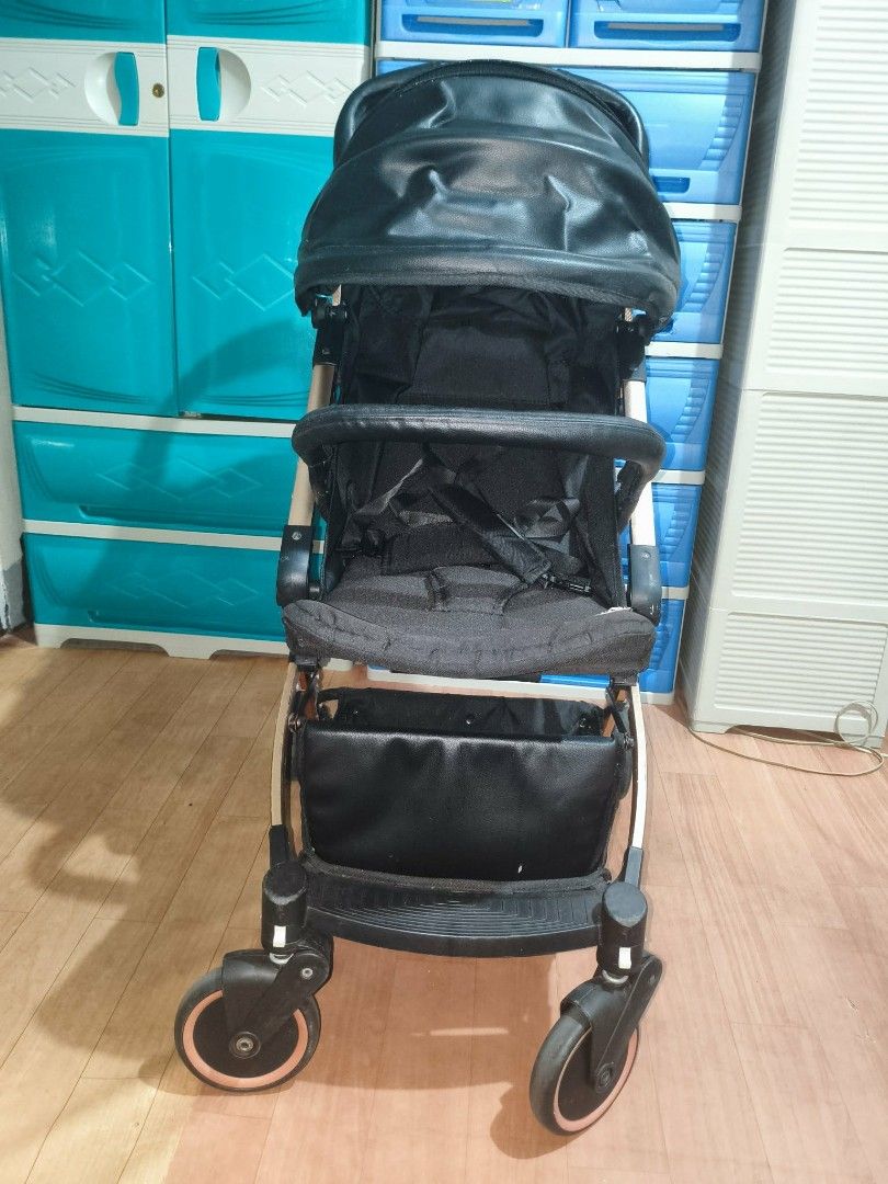 Black Lightweight Stroller with Rose Gold Accents (Category: Strollers) located in Muntinlupa City. Submitted by kimvergelrocha (Listing ID 1447862788, Image 1). Description: For sale only Akeeva Esmio Gold Stroller Price: 2199 Location: Muntinlupa City Condition: 8/10.