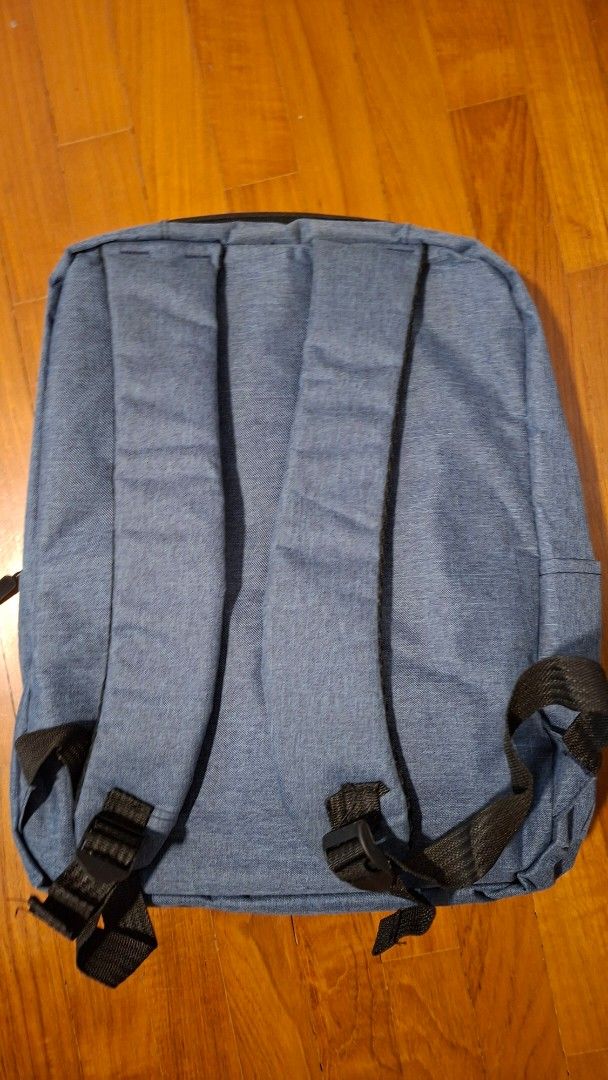 Blue Backpack (Category: Backpacks) located in Singapore. Submitted by cooldeer_455163 (Listing ID 1447744813, Image 2). Description: - Durable blue backpack - Standard size - Padded shoulder straps for comfort - Multiple front pockets - Ideal for everyday use or travel.