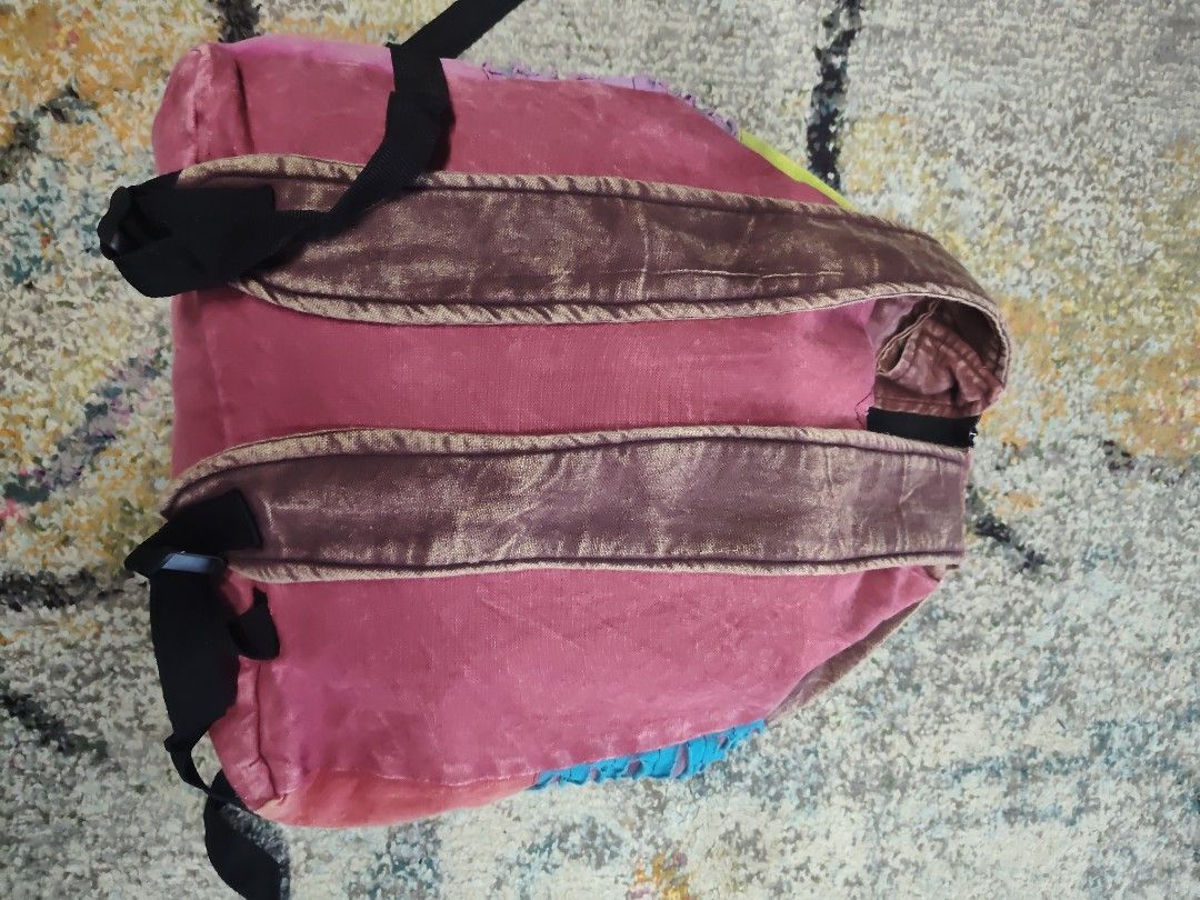 Boho Patchwork Backpack Bag (Category: Backpacks) located in Ipoh. Submitted by wajasstore (Listing ID 1447800903, Image 3). Description: - Funky patchwork backpack - Features colorful embroidered flowers and stripes - Zipper closure at the top - Adjustable straps for comfort - Ideal for everyday use or festivals - Unique and eye-catching design.