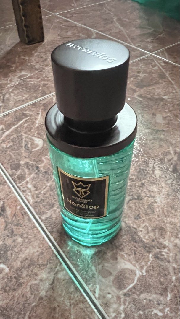 BUJAIRAMI Nonstop Perfume for Men (Category: Fragrance & Deodorants) located in Subang Jaya. Submitted by alternativel (Listing ID 1447748235, Image 1). Description: 99ml/100ml BUJAIRAMI Nonstop perfume in a teal bottle with a black cap. Beautiful teal box with embossed patterns. Great scent, selling because I have too many. Grab it now!.
