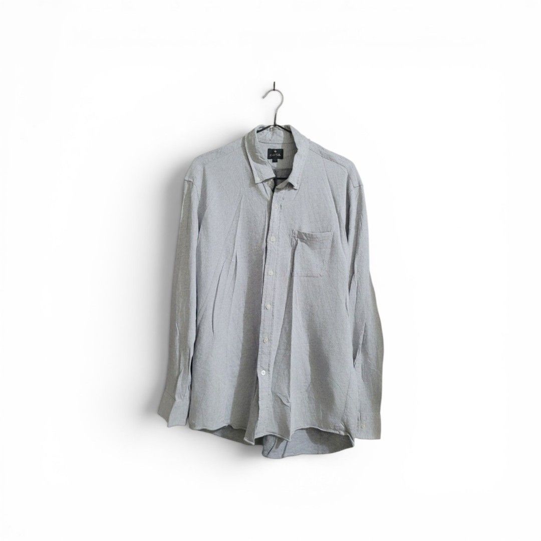 Cafe Soho Long Sleeve Shirt - Gray (Category: Longsleeves) located in Paranaque City. Submitted by mariam3842 (Listing ID 1413028965, Image 2). Description: Cafe Soho long sleeve shirt in gray. Features a button-down closure, a chest pocket, and buttoned cuffs. The shirt has a herringbone pattern. Size L. "Note: The first photo is an AI-generated model for fit and styling reference only. The remaining photos show the exact item you will receive."