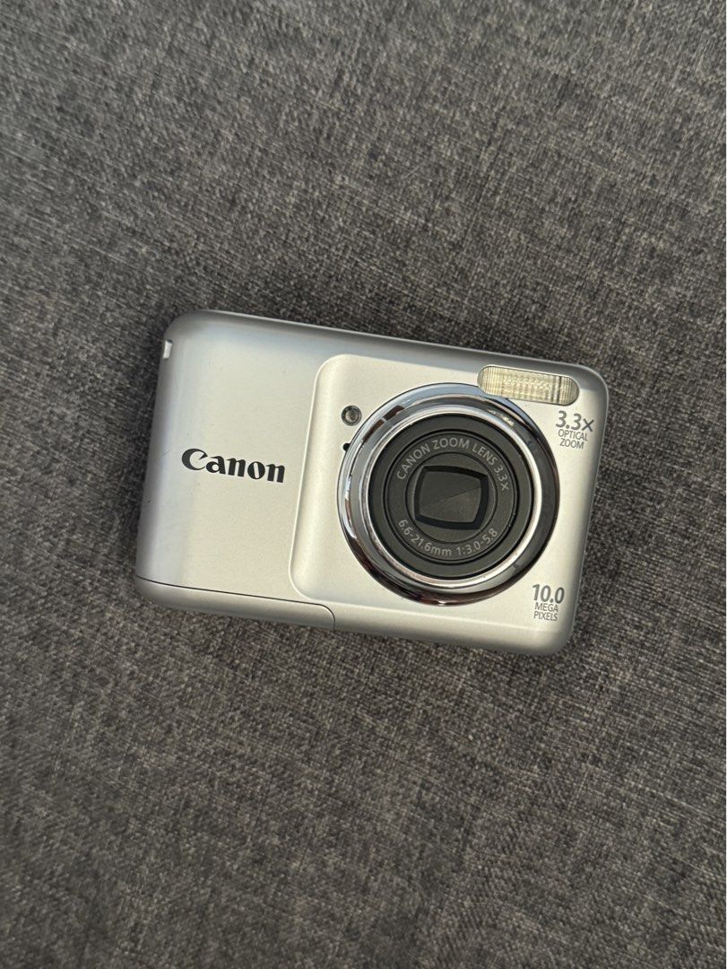 Canon Powershot A800 Silver Digicam Digital Camera (Category: Cameras) located in Cainta. Submitted by maecaroon (Listing ID 1447713298, Image 1). Description: CANON POWERSHOT A800 (Feel free to DM) HONEST ISSUES: *Middle button pad doesn’t work *Ghost touching *No cover on the cable outlet side (see slide 5) *Minimal dust on LCD (See slide 2, doesn’t affect output) Other than that, it works great! Issues can be fixed. ⭐️Working Flash ⭐️Clear LCD