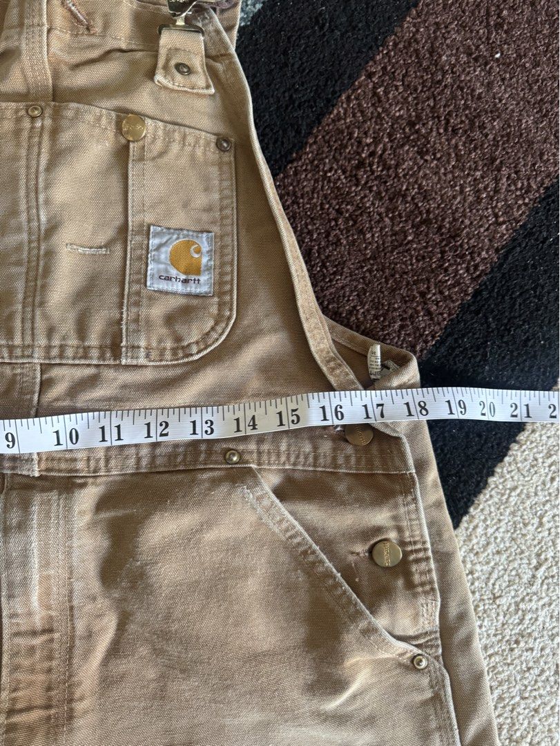 Carhartt R01 Overalls Bibs (Category: Sets & Coordinates) located in Pasig City. Submitted by canadianlootstuts (Listing ID 1447703994, Image 2). Description: In excellent used condition. Size 36x30 on tags. 100% Authentic. A minor distressed on buttom from casual wear. No paint stains or other. Sample photo wearing it. Width: 36 Leg Opener: 10 Issue: distressed button side.