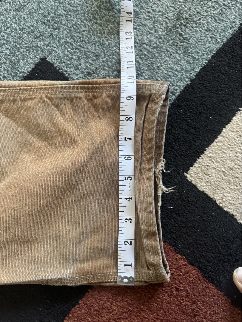 Carhartt R01 Overalls Bibs (Category: Sets & Coordinates) located in Pasig City. Submitted by canadianlootstuts (Listing ID 1447703994, Image 3). Description: In excellent used condition. Size 36x30 on tags. 100% Authentic. A minor distressed on buttom from casual wear. No paint stains or other. Sample photo wearing it. Width: 36 Leg Opener: 10 Issue: distressed button side.