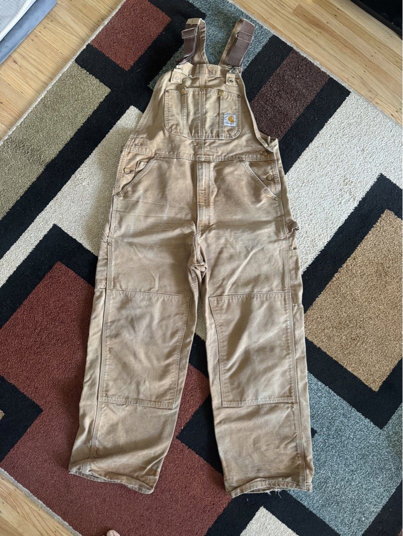 Carhartt R01 Overalls Bibs (Category: Sets & Coordinates) located in Pasig City. Submitted by canadianlootstuts (Listing ID 1447703994, Image 1). Description: In excellent used condition. Size 36x30 on tags. 100% Authentic. A minor distressed on buttom from casual wear. No paint stains or other. Sample photo wearing it. Width: 36 Leg Opener: 10 Issue: distressed button side.