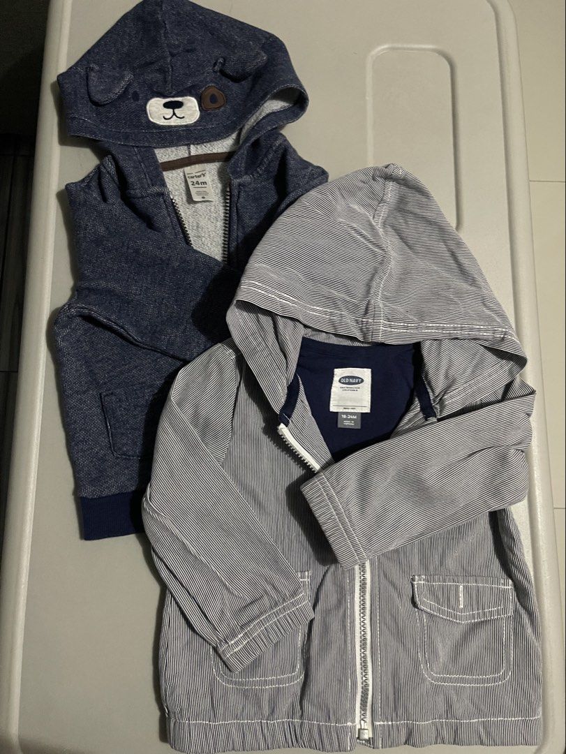 Carter's & Old Navy Baby Boy Hooded Jackets Bundle (Category: Babies & Kids Fashion) located in Quezon City. Submitted by corem (Listing ID 1447866246, Image 1). Description: - Bundle of 2 baby boy hooded jackets - Carter's dark blue zip-up hoodie with dog face on hood - Old Navy light blue & white pinstripe jacket with pockets - Perfect for layering and everyday wear.