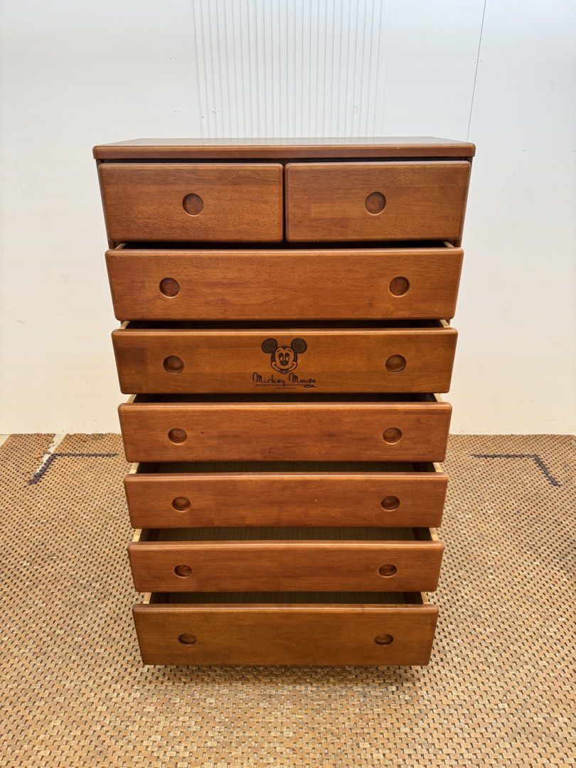 Chest of drawers (Category: Shelves, Cabinets & Racks) located in Quezon City. Submitted by matetdevis13 (Listing ID 1447876816, Image 3). Description: 8-Tier Wooden Mickey Mouse Chest of Drawers Price: 6,500 L35.5 x W17.5 x H59 In good condition Code JMD35-D2.