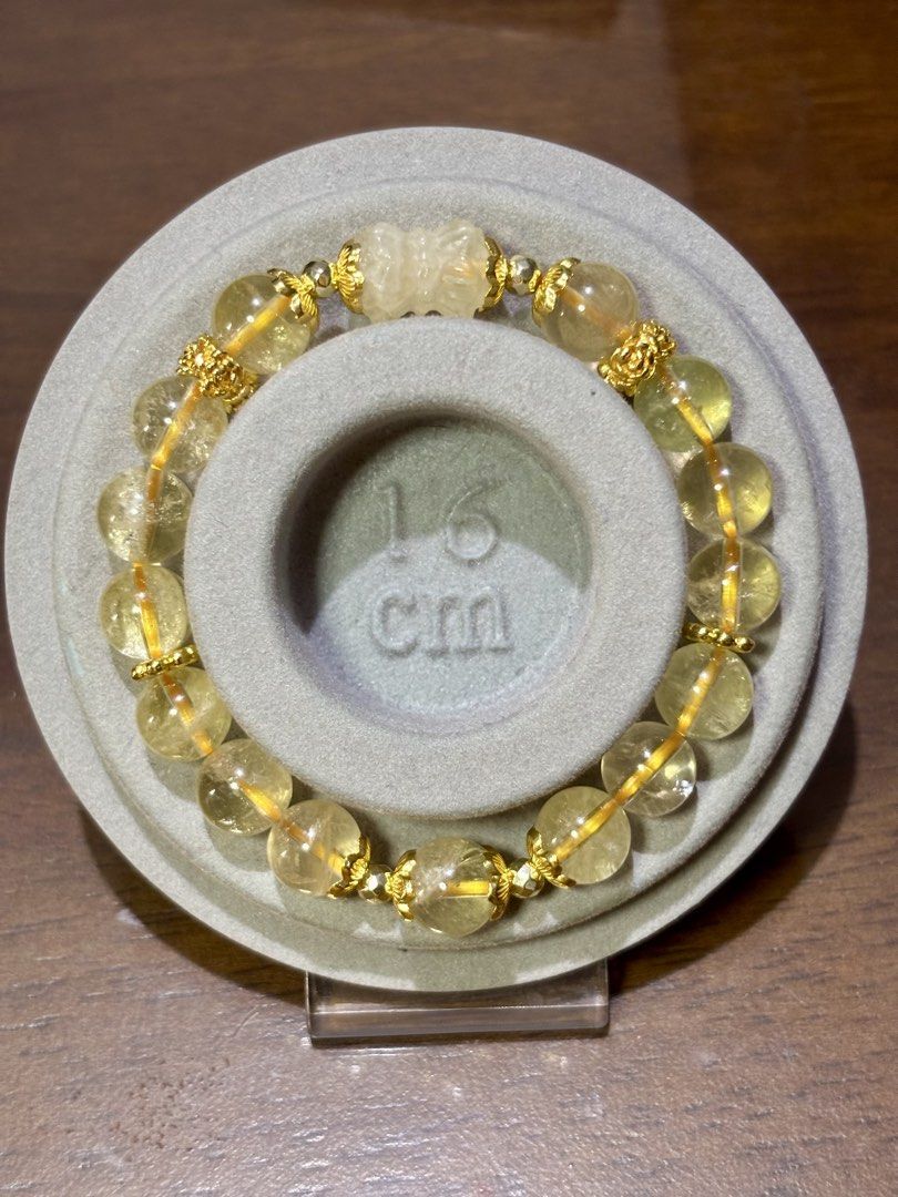 Citrine Bracelet with Double Lotus Charm (Category: Bracelets) located in Pasig City. Submitted by talaversify (Listing ID 1447787136, Image 3). Description: Semi-precious stone: Citrine with double lotus Citrine Charm Stone size: 10mm Wrist size: 16cm 💠 Natural stone 💠 .