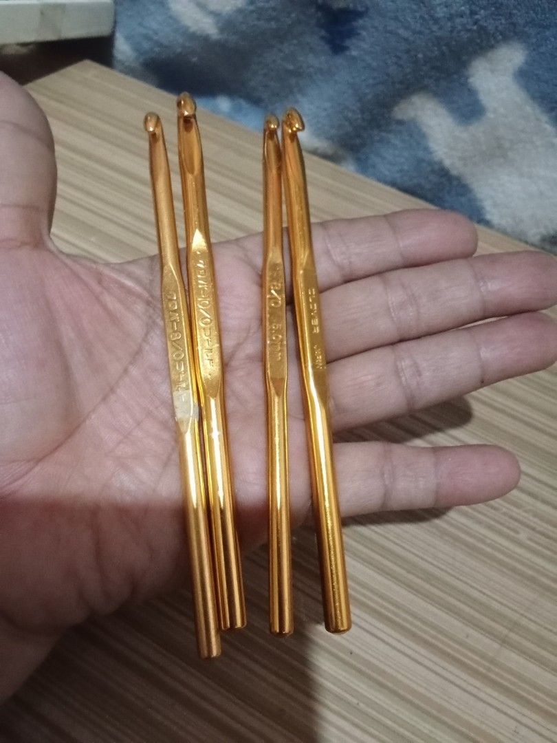 Clover Crochet Hooks Set - Gold Metal (Category: Craft Supplies & Tools) located in Bocaue. Submitted by marajapansurplus (Listing ID 1447726320, Image 3). Description: - Set of 4 Clover crochet hooks - Sizes: 1.5mm, 1.75mm, 2.0mm, 2.25mm - Gold metal finish - Authentic Clover brand from Japan - Ideal for detailed crochet projects - One hook has minor signs of use, but all are fully functional.