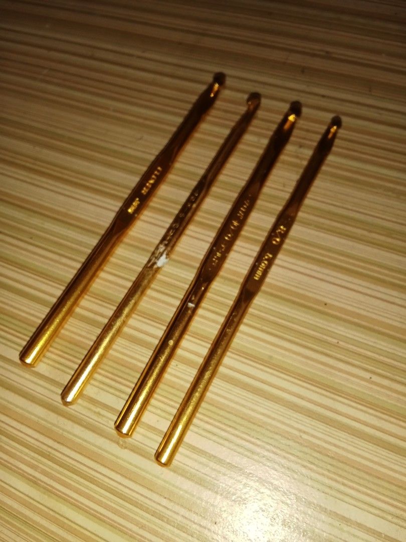 Clover Crochet Hooks Set - Gold Metal (Category: Craft Supplies & Tools) located in Bocaue. Submitted by marajapansurplus (Listing ID 1447726320, Image 1). Description: - Set of 4 Clover crochet hooks - Sizes: 1.5mm, 1.75mm, 2.0mm, 2.25mm - Gold metal finish - Authentic Clover brand from Japan - Ideal for detailed crochet projects - One hook has minor signs of use, but all are fully functional.