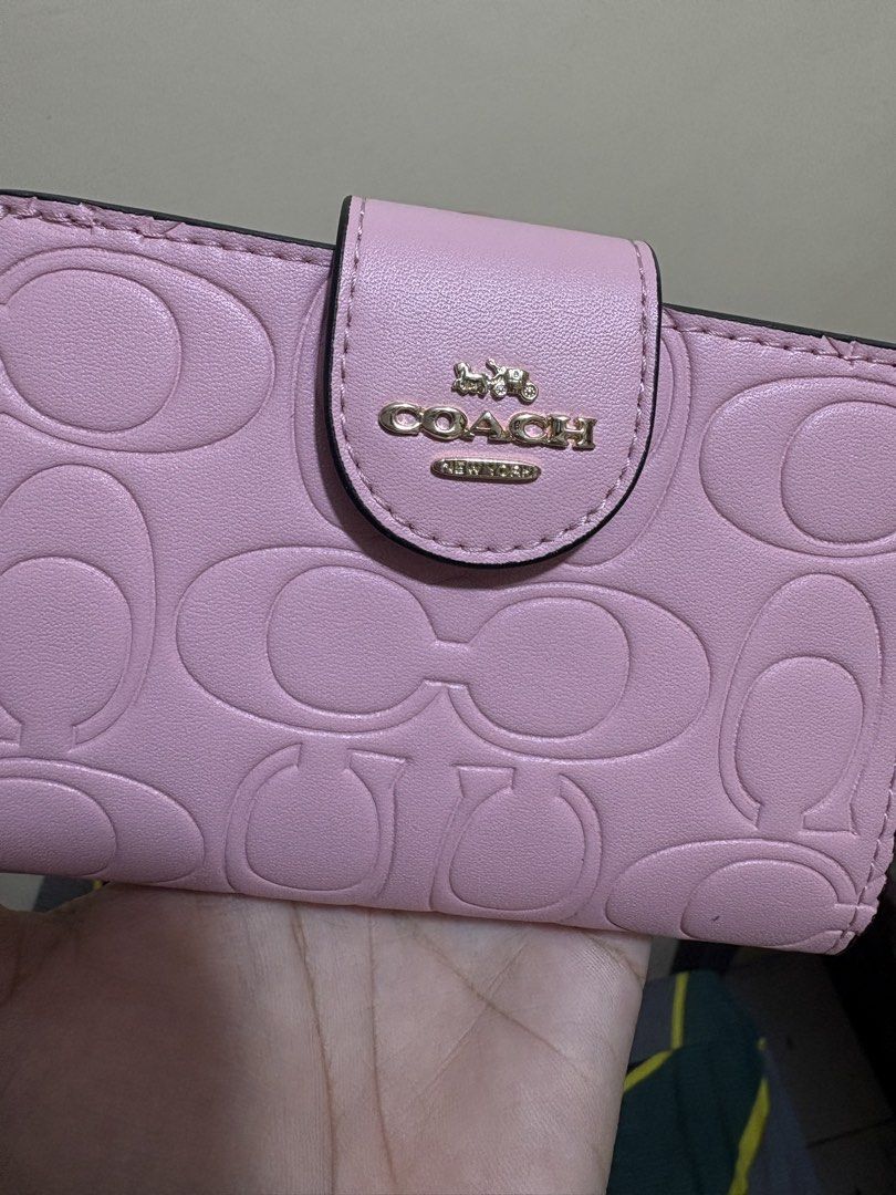 Coach medium wallet (Category: Wallets & Card holders) located in Subic. Submitted by lenhub (Listing ID 1447725964, Image 2). Description: Fresh form Japan 🇯🇵 Price plus sf via j&t.