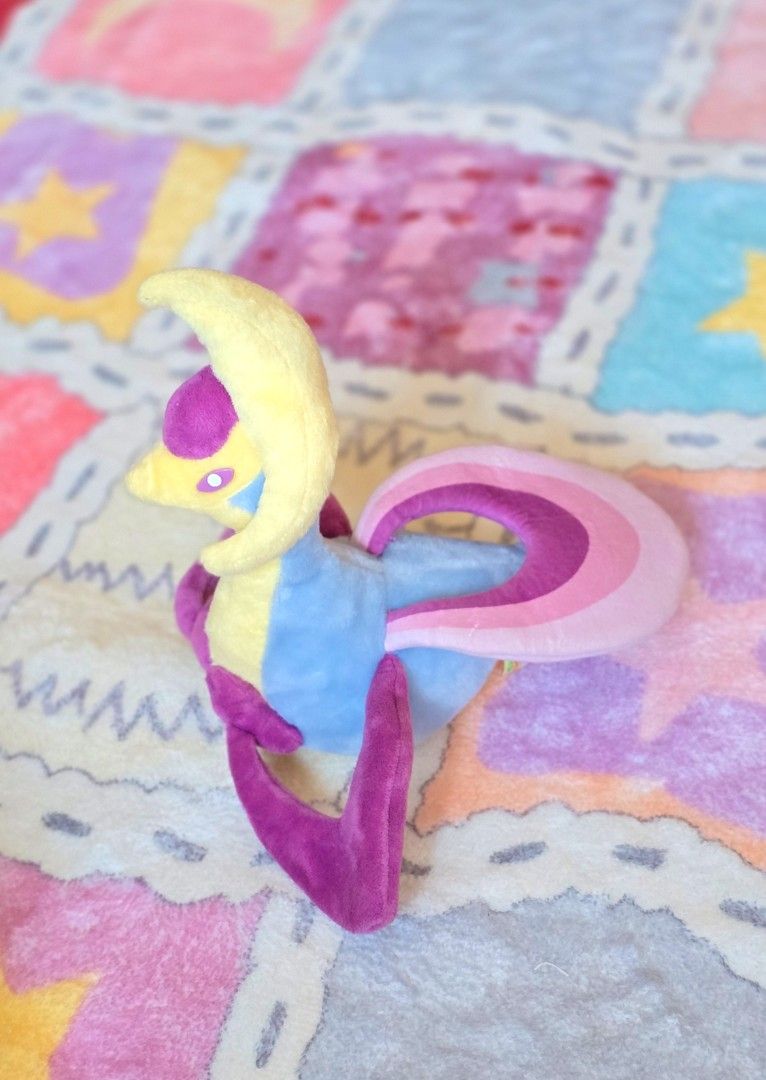 Cresselia Pokemon Plush [T-ARTS] (Category: Plushies & Soft Toys) located in Paranaque City. Submitted by vanchris84 (Listing ID 1447828825, Image 1). Description: - Soft plush toy, approximately 8 inches tall. - T-ARTS etiketa - Like brand new.