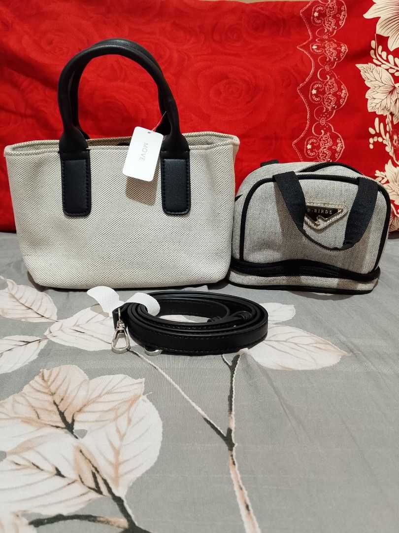 D-BIRDS Canvas Tote Bag with Pouch and Strap (Category: Tote Bags) located in Manila. Submitted by youngdragon.0d29ca (Listing ID 1447799895, Image 1). Description: - Stylish canvas tote bag with black handles and trim. - Includes a matching zippered pouch featuring the D-BIRDS logo. - Detachable shoulder strap for versatile carrying options. - Ideal for everyday errands or your next travel adventure. - Brand new with tag attached..