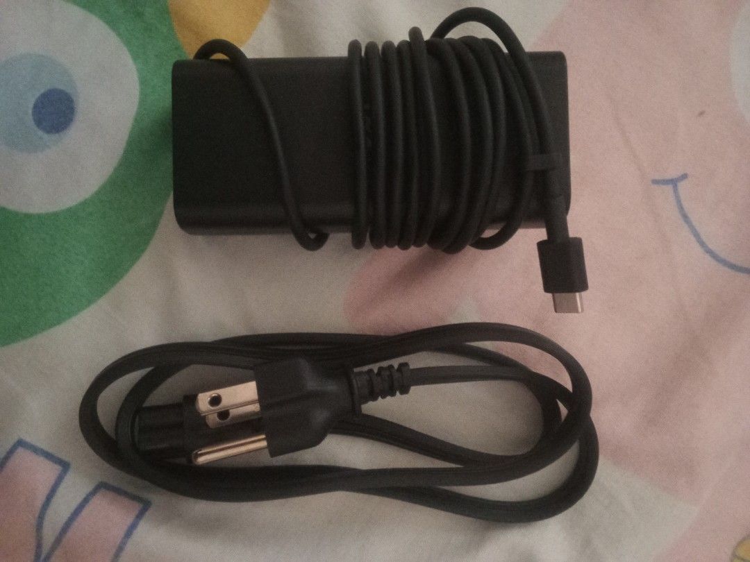 Dell original 65watts type c (Category: Chargers) located in Taguig. Submitted by carlsab (Listing ID 1447703898, Image 2). Description: DELL laptop charger TYPE C 65WATTS BRAND NEW.