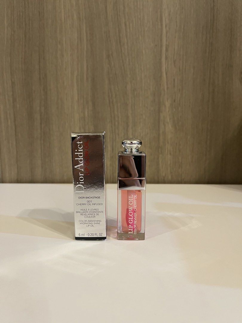 Dior Addict Lip Glow Oil - Cherry (Category: Makeup) located in Manila. Submitted by kevintotin49861 (Listing ID 1447729450, Image 1). Description: - Dior Addict Lip Glow Oil in Cherry shade - Color reviver for a natural flush - Enriched with nourishing cherry oil - Intense hydration and a beautiful shiny finish - Comfortable, non-sticky, non-greasy feel - Lips appear fuller and feel moisturized - Long-lasting shine.