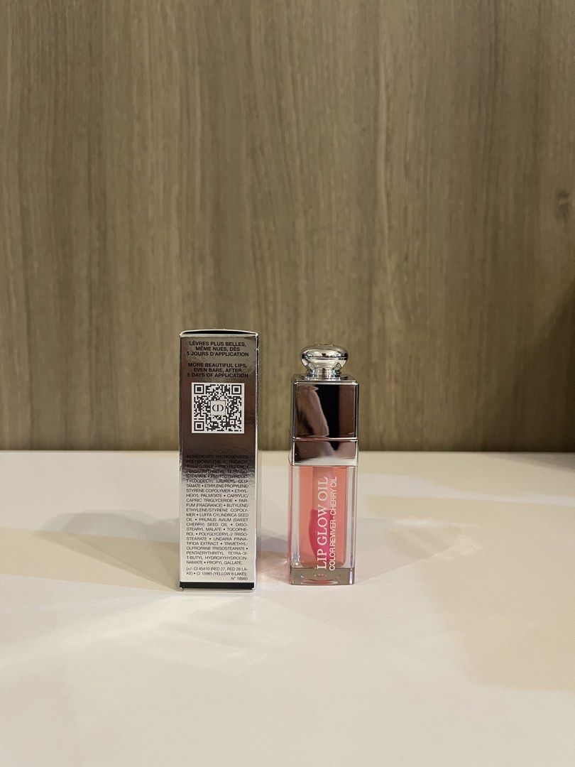 Dior Addict Lip Glow Oil - Cherry (Category: Makeup) located in Manila. Submitted by kevintotin49861 (Listing ID 1447729450, Image 2). Description: - Dior Addict Lip Glow Oil in Cherry shade - Color reviver for a natural flush - Enriched with nourishing cherry oil - Intense hydration and a beautiful shiny finish - Comfortable, non-sticky, non-greasy feel - Lips appear fuller and feel moisturized - Long-lasting shine.