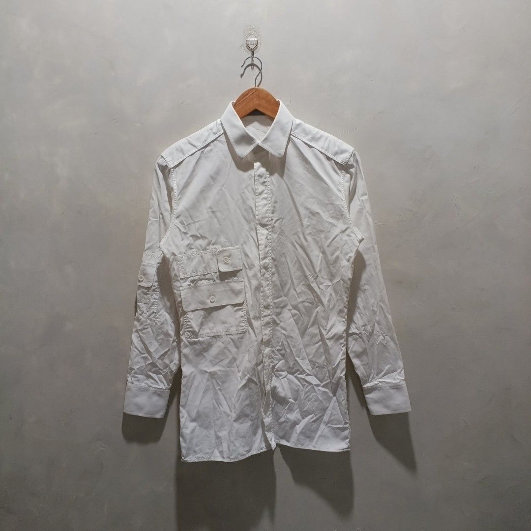 Dior White LongSleeve Left Pocket (Authentic) (Category: Tshirts & Polo Shirts ) located in Malasiqui. Submitted by drie_findss (Listing ID 1447685416, Image 1). Description: Dior White LongSleeve Left Pocket (Authentic) ‎_______________________ ‎Size: 37 on tag ‎(Measured by Inches) ‎Width: 17.5 ‎Length: 28 ‎Shoulder: 16 ‎Sleeve: 22 ‎Condition: EXCELLENT ‎Color Rate: 10/10 ‎Issue: None ‎_______________________ ‎ ‎Color may vary due to lightning 