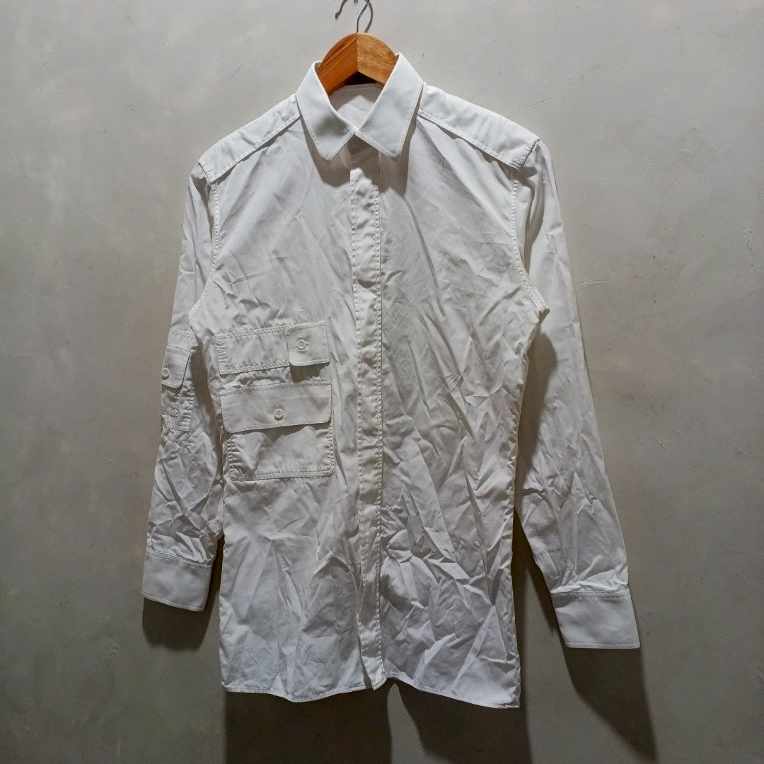 Dior White LongSleeve Left Pocket (Authentic) (Category: Tshirts & Polo Shirts ) located in Malasiqui. Submitted by drie_findss (Listing ID 1447685416, Image 2). Description: Dior White LongSleeve Left Pocket (Authentic) ‎_______________________ ‎Size: 37 on tag ‎(Measured by Inches) ‎Width: 17.5 ‎Length: 28 ‎Shoulder: 16 ‎Sleeve: 22 ‎Condition: EXCELLENT ‎Color Rate: 10/10 ‎Issue: None ‎_______________________ ‎ ‎Color may vary due to lightning 