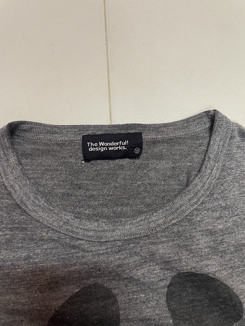 Disney Mickey Mouse Club x BEAMS T-shirt (Category: Tshirts & Polo Shirts) located in Kuala Lumpur. Submitted by markjark2185621 (Listing ID 1447824499, Image 3). Description: - Grey t-shirt with a fun Donald Duck -Pit 17 -Length 26 -Condtion 8.5/10 dressed as Mickey Mouse graphic. - Features a Disney Mickey Mouse Club patch. - Includes a BEAMS tag. - Note: There are a couple of small holes on the sleeve. - Ideal for any Disney fan! Ada 1 lubang 