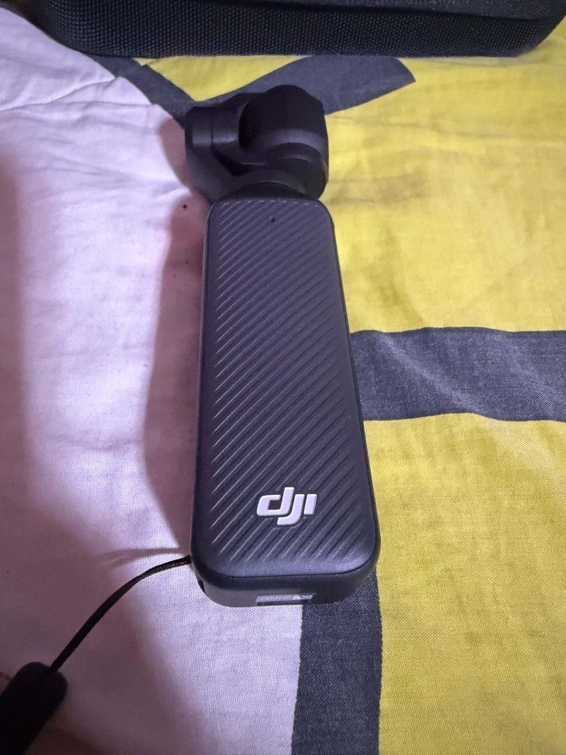 DJI Osmo Pocket 3 Gimbal Stabilizer with Accessories (Category: Gimbals & Stabilizers ) located in San Mateo. Submitted by chammshoppe (Listing ID 1447694758, Image 2). Description: - DJI Osmo Pocket 3 - Includes original box, carrying case, and charging cable - Ideal for capturing smooth, stable video footage - Perfect for travel and everyday adventures - Ready to use! -Smooth w/ tg installed -Fixed price RFS: I seldom use it. almost new..
