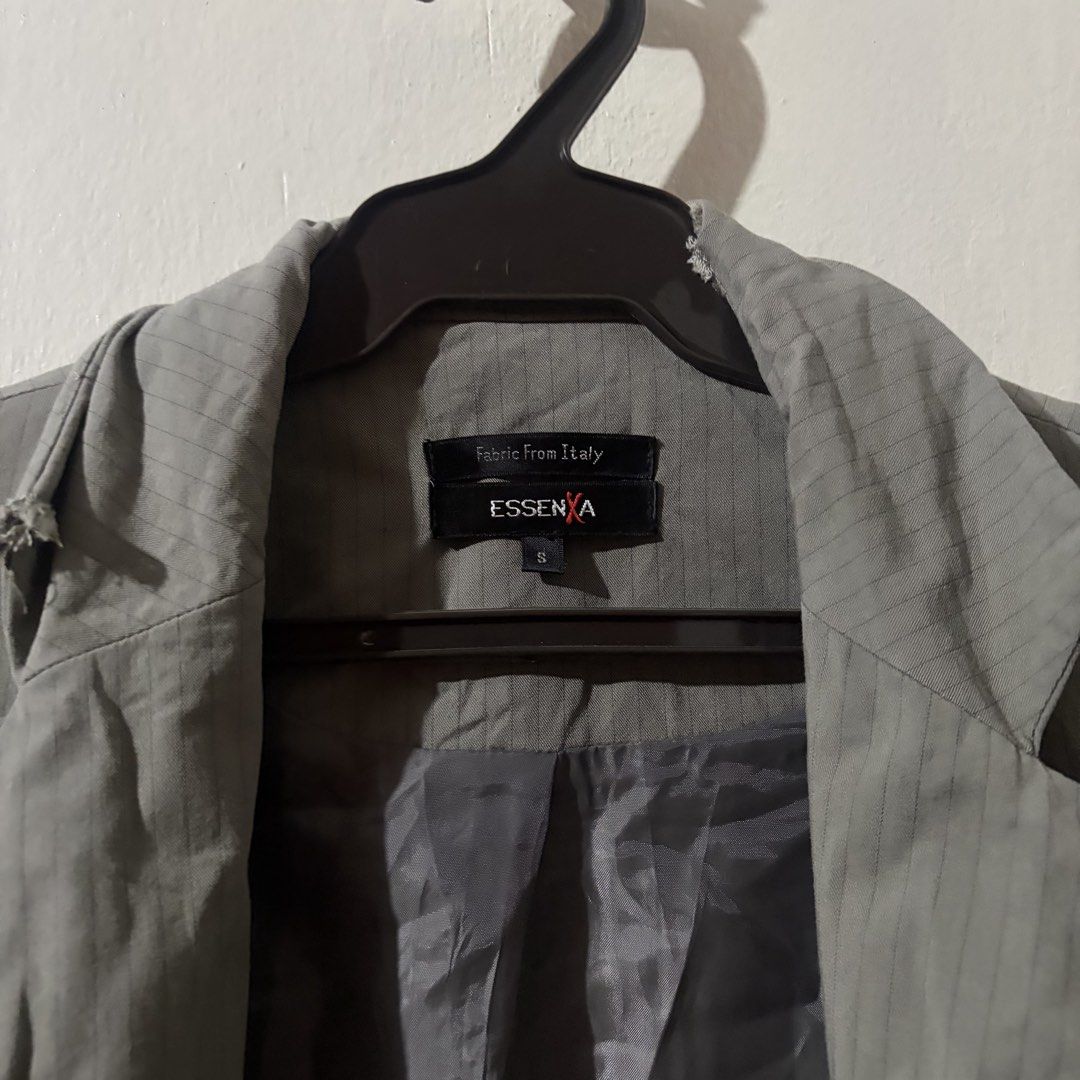 ESSENXA Grey Blazer with Italian Fabric (Category: Coats, Jackets and Outerwear) located in Manila. Submitted by lalebilolu (Listing ID 1447722379, Image 3). Description: - ESSENXA Grey Blazer - Made with Italian fabric - Size: S - Two front pockets - Minor damage on neck/shoulder area (check photos).