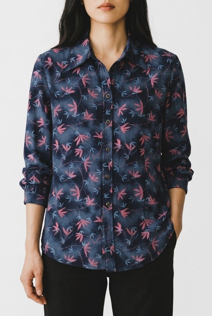 Floral Print Long Sleeve Shirt (Category: Blouses) located in Paranaque City. Submitted by mariam3842 (Listing ID 1413029326, Image 1). Description: - Dark blue long-sleeved shirt. - Features a floral pattern (pink and light blue). - Classic collar and button-down closure. - Can fit M-L sizes. - Buttoned cuffs. - Lightweight fabric. - Perfect for hot and warmer weather. "Note: The first photo is an AI-generated model for fit and styling reference