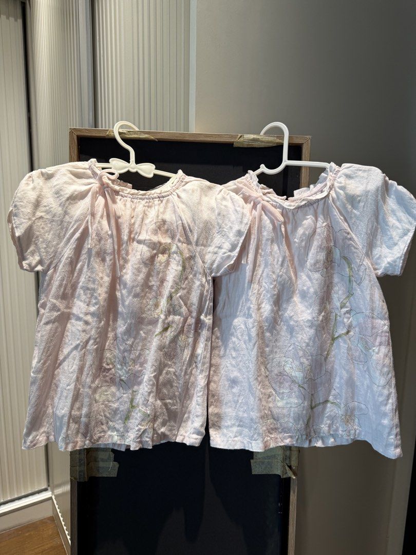 Gingersnaps Baby Dress (Category: Babies & Kids Fashion) located in Manila. Submitted by ctluxefinds (Listing ID 1447711435, Image 2). Description: - 600 each - Good as new! Needs to be ironed. - Cute pink dress for baby - Features a charming orchid print all over - Ruffled neckline with a tie detail - Short sleeves for comfort - Made from lightweight, breathable fabric - Versatile for casual outings or special events.