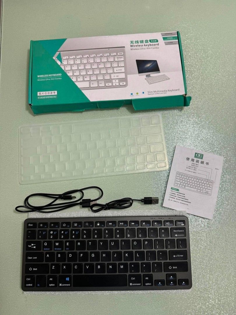 GOOJODOQ Wireless Bluetooth Keyboard (Pre-Loved) (Category: Computer Keyboard) located in San Juan City. Submitted by jenteria10 (Listing ID 1447791961, Image 1). Description: - Slim and compact wireless keyboard - Connects easily via Bluetooth - Includes USB charging cable - Compatible with Android, Windows, and iOS devices - Ideal for seamless switching between multiple devices.